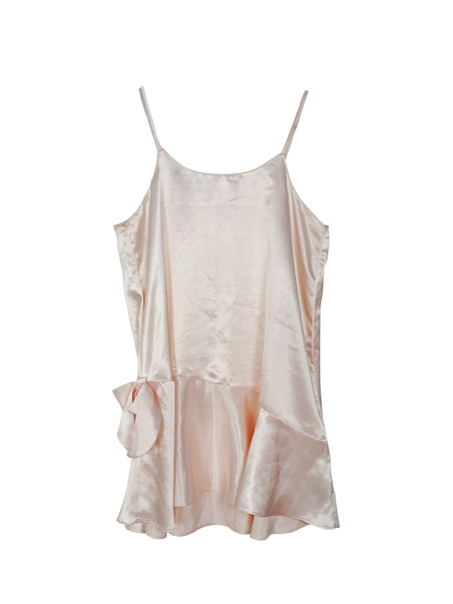 Light pink satin slip dress on a white background